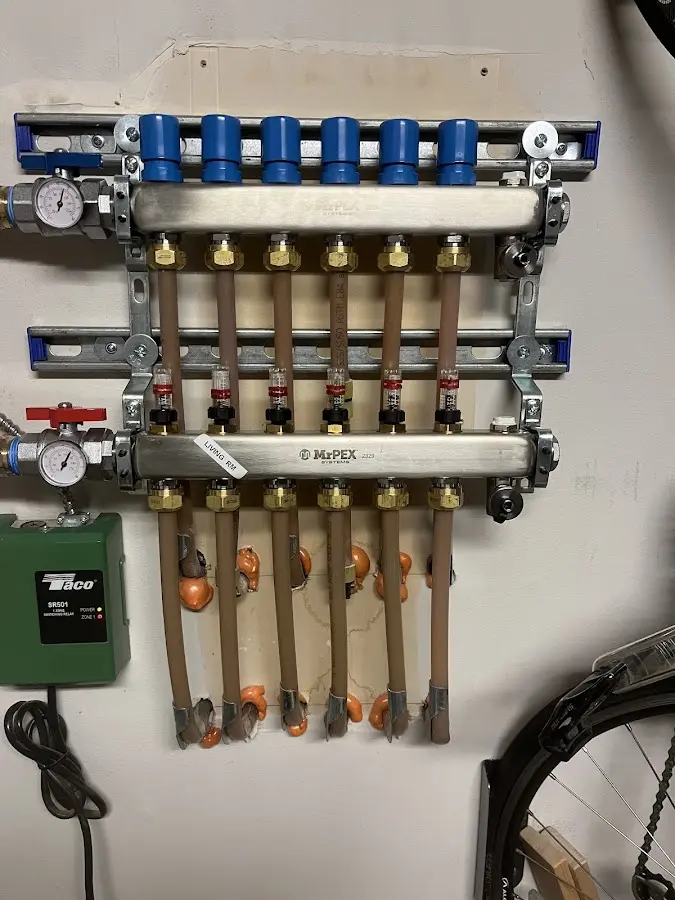 Plumber performing Leak Detection at a residential property in Harper Woods